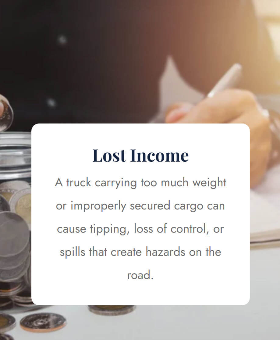 A jar of coins and scattered change beside a person writing financial documents, representing lost income compensation after a truck accident injury.